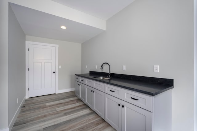 465 Cedar Hill Dr, Williamstown, KY 41097 - bar area featuring a sink, light wood-style flooring, baseboards, and recessed lighting