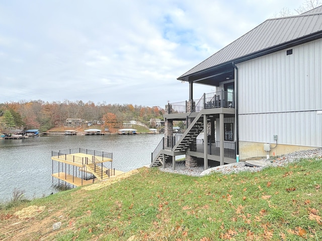 465 Cedar Hill Dr, Williamstown, KY 41097 - dock area featuring stairs, a water view, and a lawn