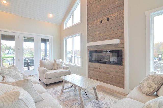465 Cedar Hill Dr, Williamstown, KY 41097 - living room featuring a glass covered fireplace, light wood finished floors, high vaulted ceiling, and recessed lighting