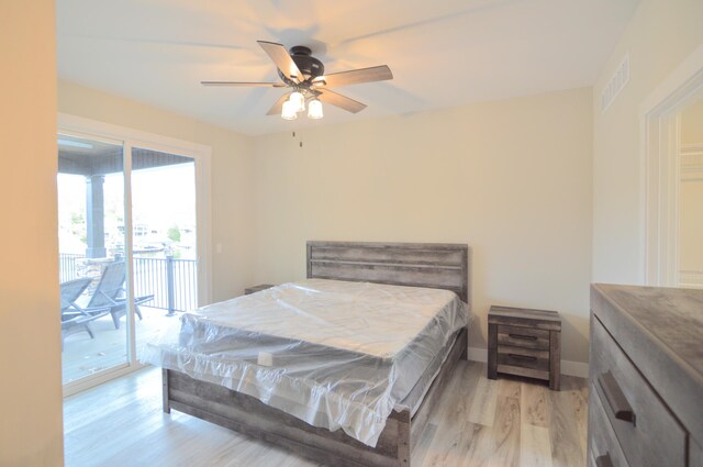 465 Cedar Hill Dr, Williamstown, KY 41097 - bedroom with access to outside, light wood-style flooring, a ceiling fan, and baseboards