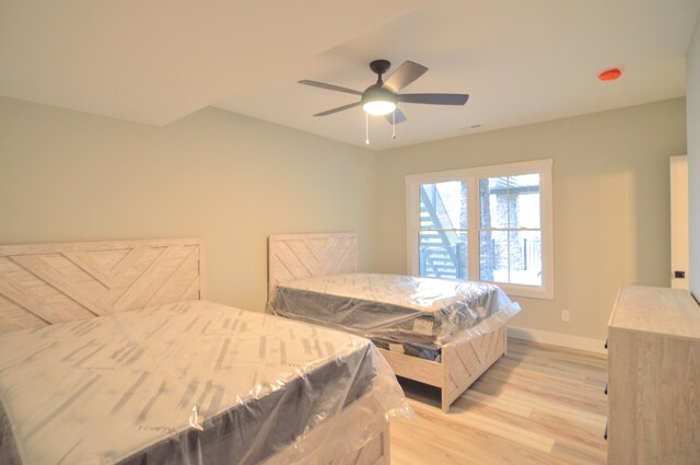 465 Cedar Hill Dr, Williamstown, KY 41097 - bedroom featuring light wood-style flooring, baseboards, and a ceiling fan