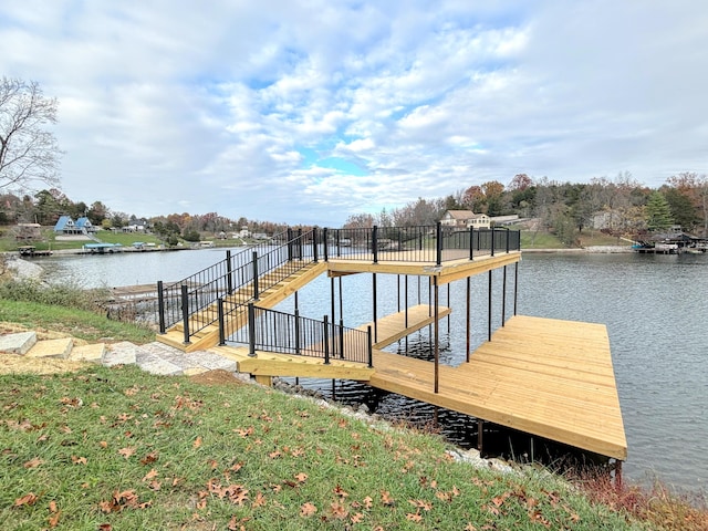 dock area with a water view