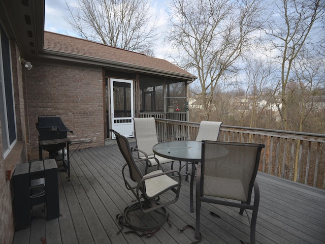 wooden deck featuring grilling area