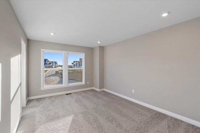 view of carpeted spare room