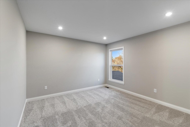 view of carpeted spare room