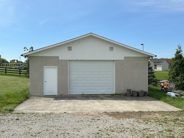 garage with a yard