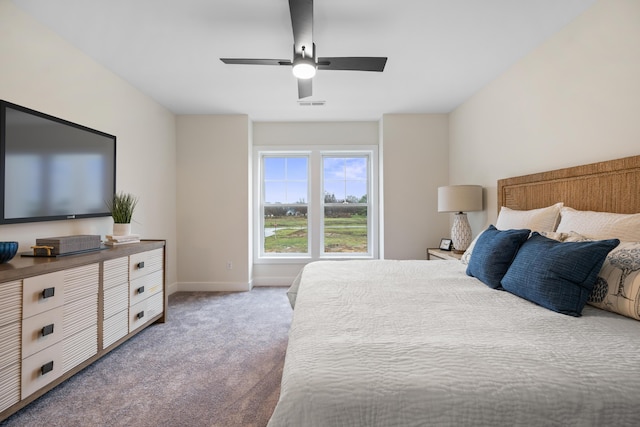 carpeted bedroom with ceiling fan