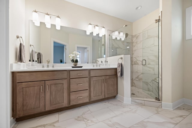 bathroom with vanity and a shower with shower door