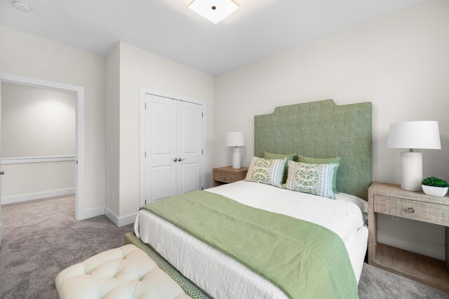 carpeted bedroom featuring a closet