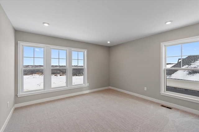 view of carpeted spare room