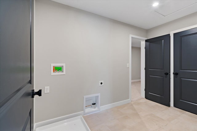 laundry room featuring electric dryer hookup and washer hookup