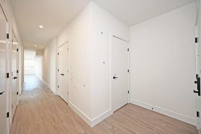 hallway featuring light hardwood / wood-style flooring