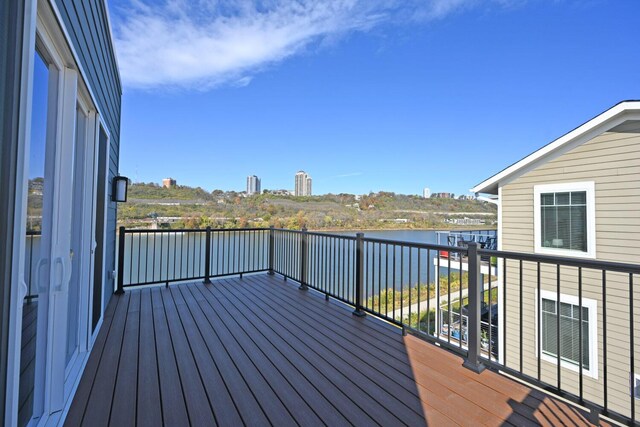 deck featuring a water view