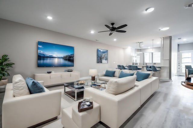 living room featuring ceiling fan