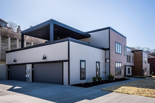 view of property exterior featuring a garage