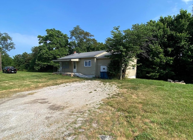 view of front of home with a front yard