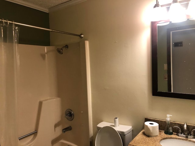 full bathroom featuring toilet, a textured ceiling, shower / tub combo with curtain, and sink