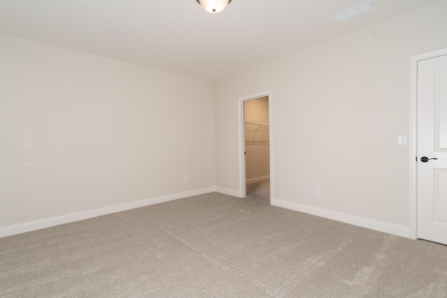 empty room with carpet flooring