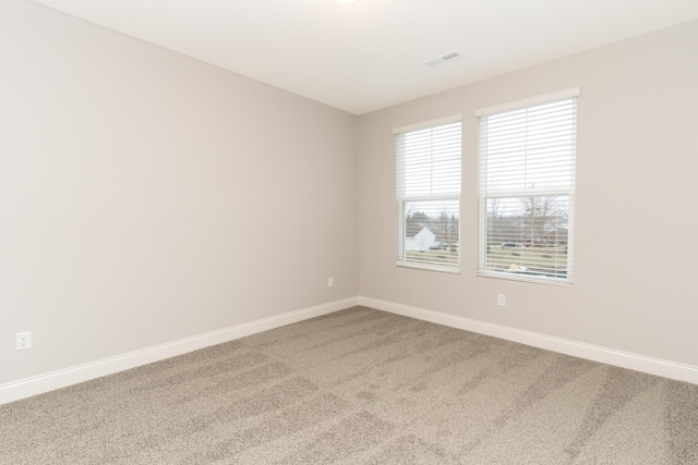 empty room with carpet floors