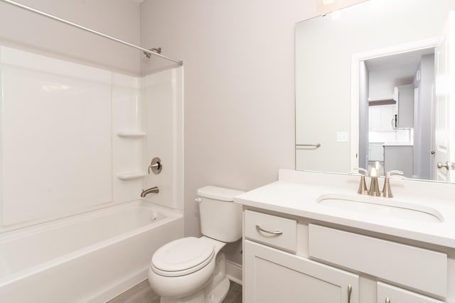 full bathroom with shower / bath combination, vanity, and toilet