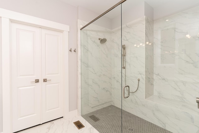 bathroom featuring an enclosed shower