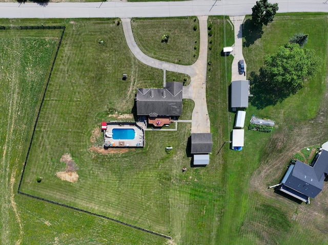 birds eye view of property featuring a rural view