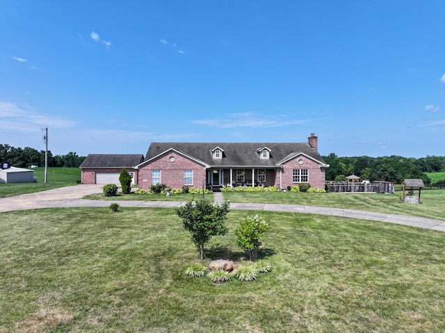 ranch-style home featuring a garage and a front lawn