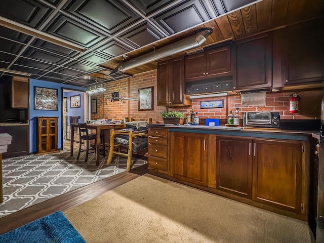 bar featuring brick wall and carpet