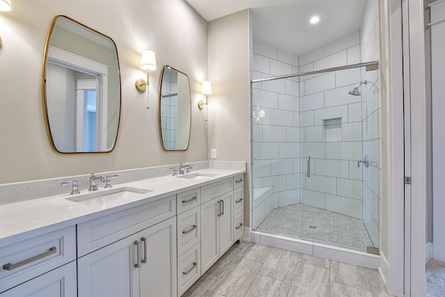 bathroom with vanity and walk in shower