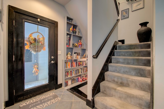 entrance foyer with tile patterned flooring