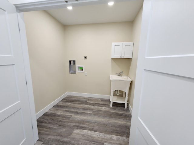 laundry room featuring dark wood-style floors, washer hookup, electric dryer hookup, and baseboards