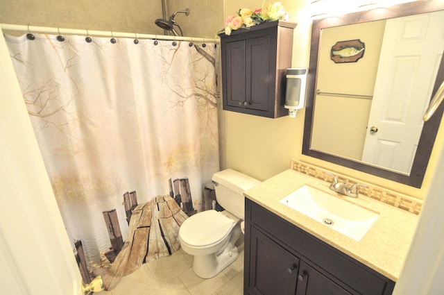 bathroom featuring vanity, tile patterned flooring, toilet, and a shower with shower curtain