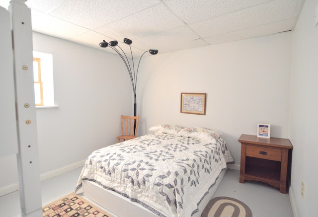 bedroom with a drop ceiling