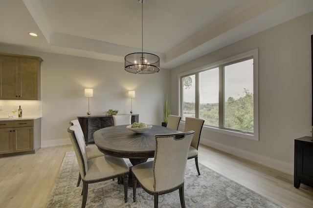 828 Fairbanks Ln, Southgate, KY 41071 - dining room with a tray ceiling, light wood-type flooring, baseboards, recessed lighting, and an inviting chandelier