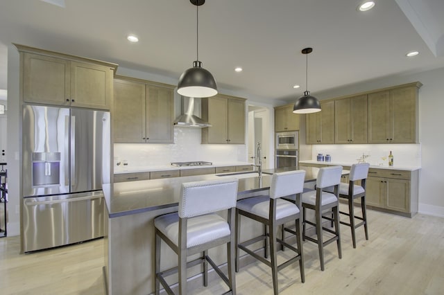 828 Fairbanks Ln, Southgate, KY 41071 - kitchen featuring wall chimney range hood, a sink, appliances with stainless steel finishes, and light wood finished floors