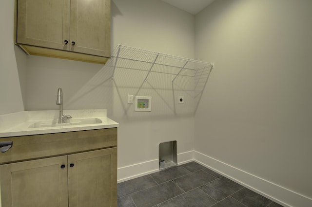 828 Fairbanks Ln, Southgate, KY 41071 - laundry room featuring hookup for a washing machine, baseboards, a sink, electric dryer hookup, and cabinet space