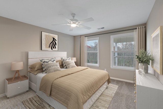 carpeted bedroom featuring ceiling fan