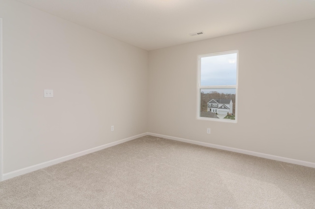 unfurnished room with carpet