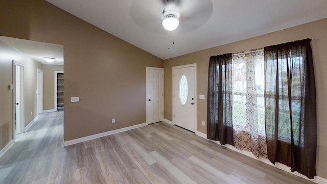 304 Brentwood Dr, Dry Ridge, KY 41035 - foyer entrance with lofted ceiling, light wood-style floors, a ceiling fan, and baseboards