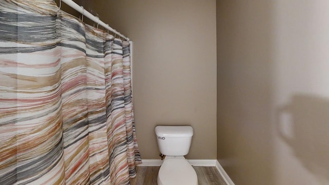 304 Brentwood Dr, Dry Ridge, KY 41035 - full bathroom featuring toilet, baseboards, wood finished floors, and a shower with shower curtain