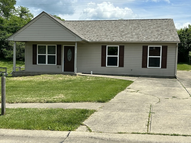 304 Brentwood Dr, Dry Ridge, KY 41035 - view of front of house featuring a front yard, roof with shingles, and a porch