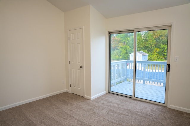 doorway with light carpet