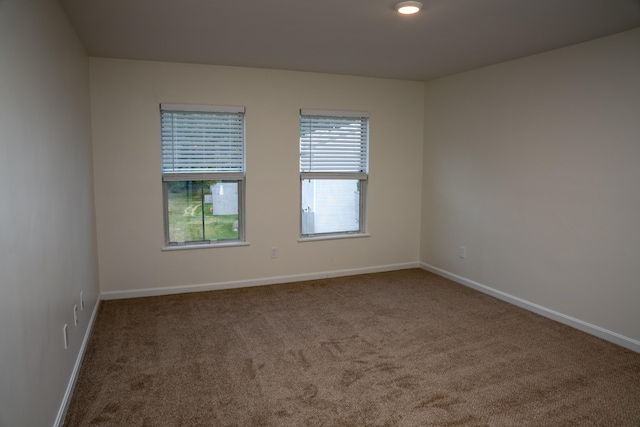 view of carpeted spare room