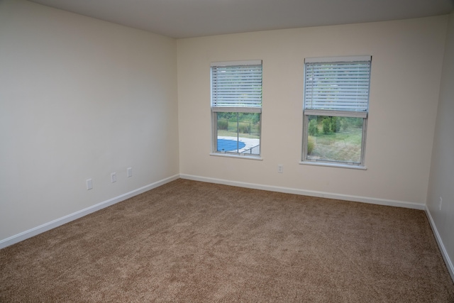 view of carpeted spare room