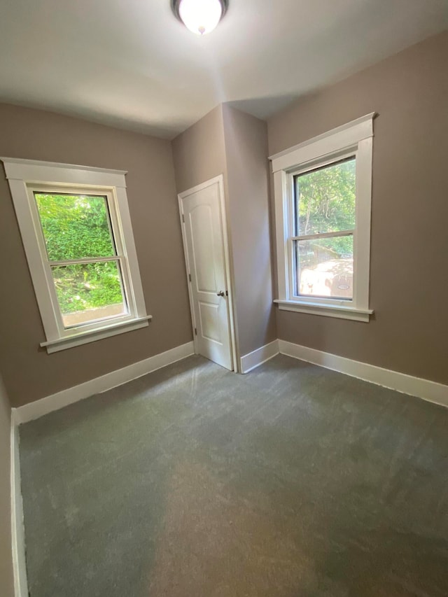 unfurnished bedroom with carpet flooring