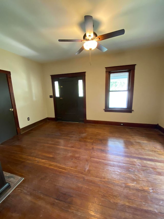 entryway with ceiling fan and hardwood / wood-style flooring