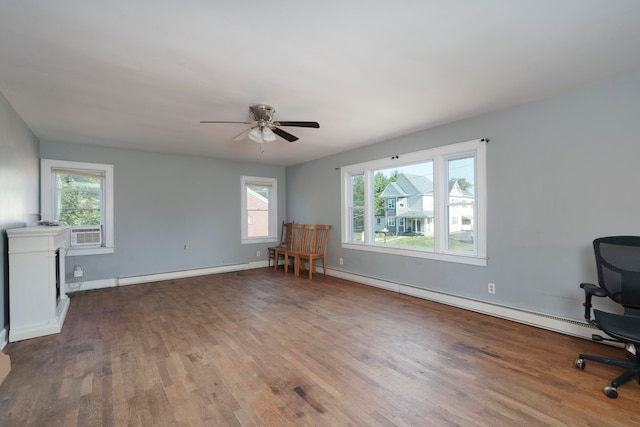 interior space with ceiling fan, hardwood / wood-style floors, and a baseboard radiator