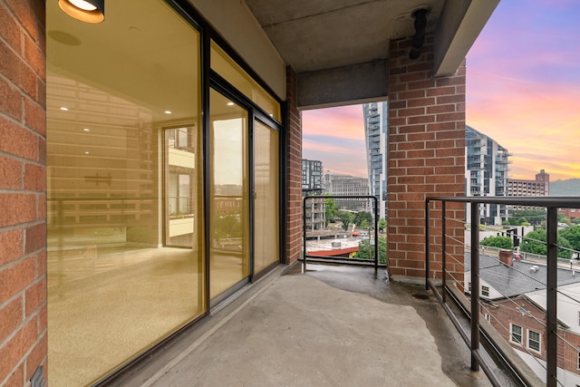 view of balcony at dusk