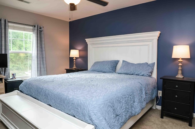 carpeted bedroom featuring ceiling fan