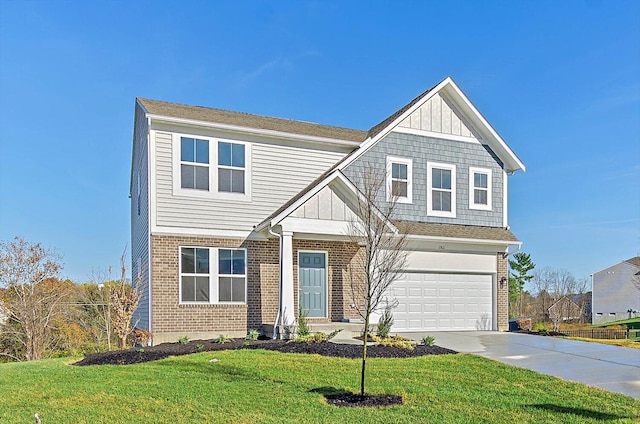 view of front of property with a garage and a front lawn